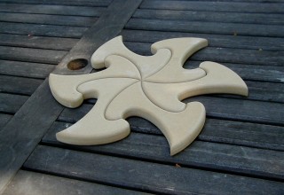 Six CNC-cut wood tiles made by Walter Lampert snugly arranged around one vertex